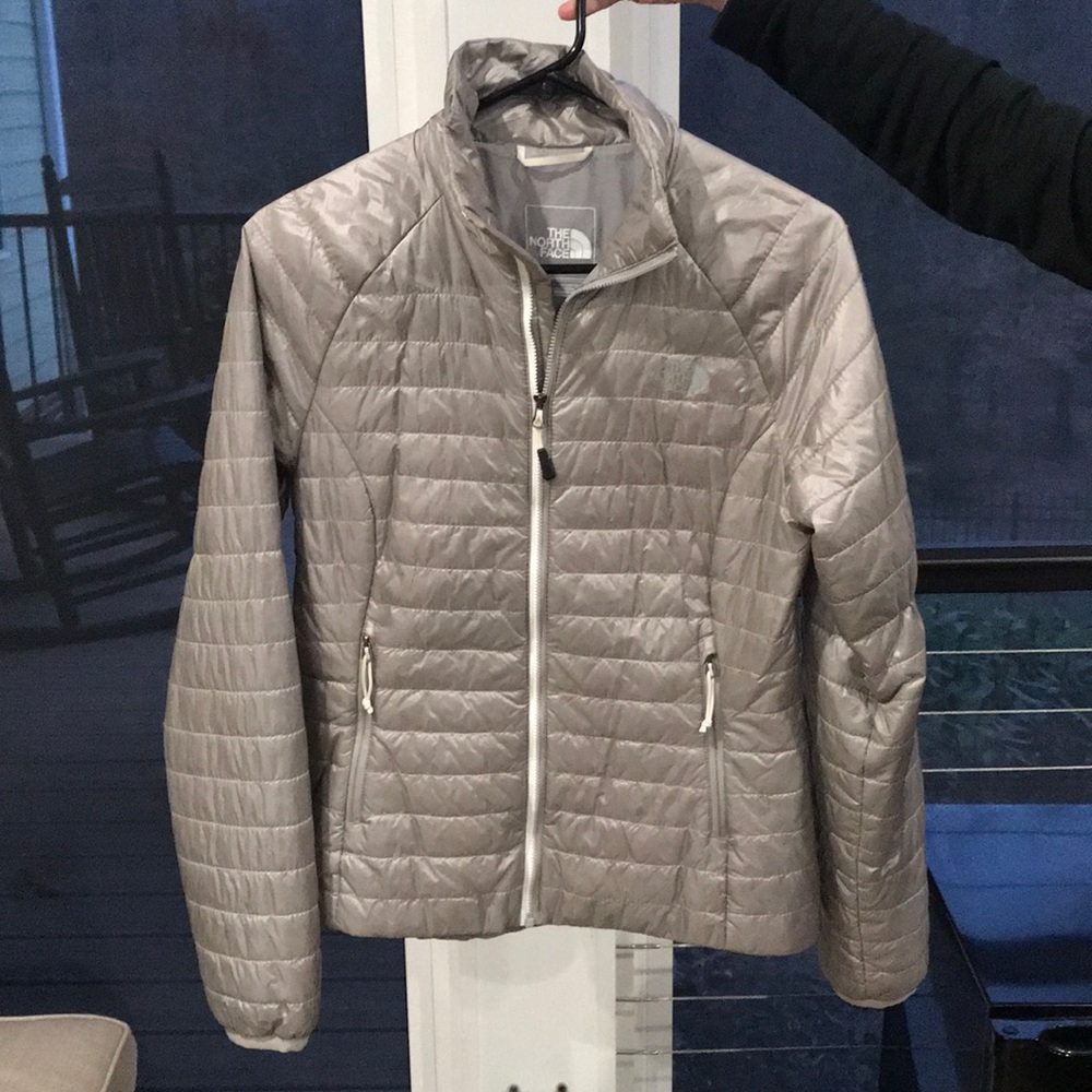Grey North Face puffy jacket